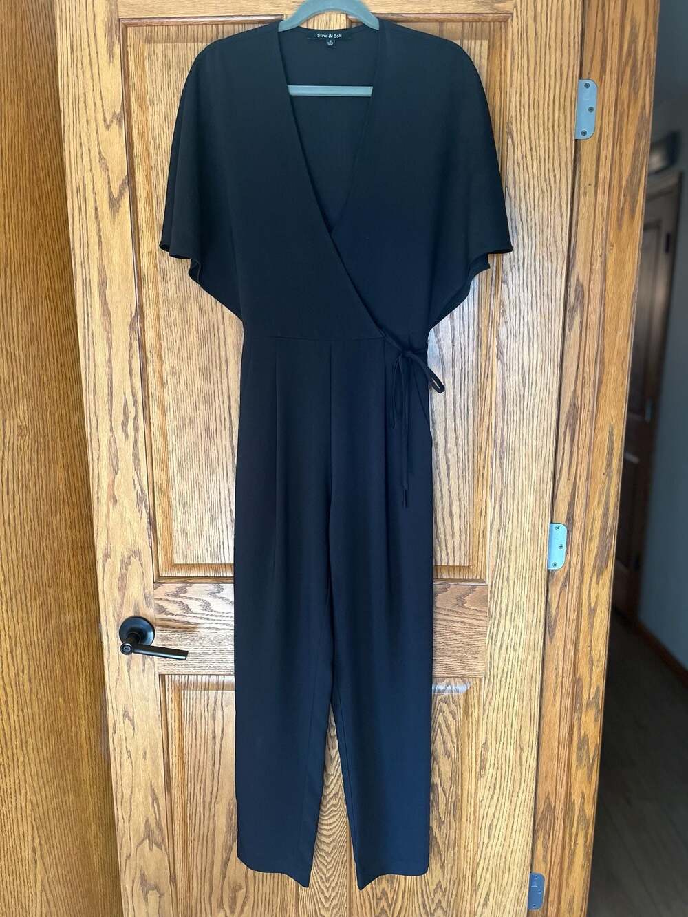 Strut & Bolt Black Flutter Sleeve V-Neck Wrap Jumpsuit Size S
